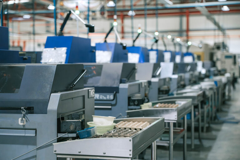 Modern CNC machining production line inside industrial factory
